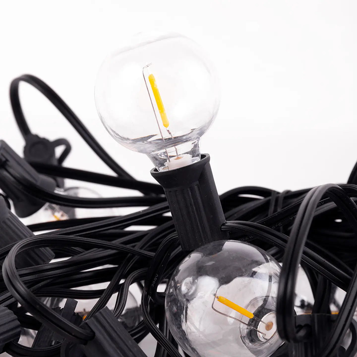 Corrente 25 LÃ¢mpadas LED G40 2700ÂºK 9,5M Solar - Painel: 5,5V 1,2W Bateria: 3,7V 1200Mah [Ho-Cad-25-Sol-Ww] 3