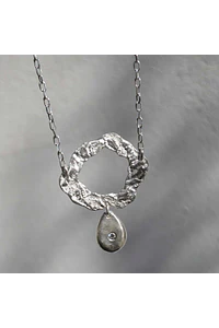 COLLAR DEL VACÍO A LA SEMILLA  -  PLATA 950 Y MOISSANITA
