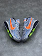 Nike Tenis Zoom GT Hustle 3 Safari - Miniatura 1