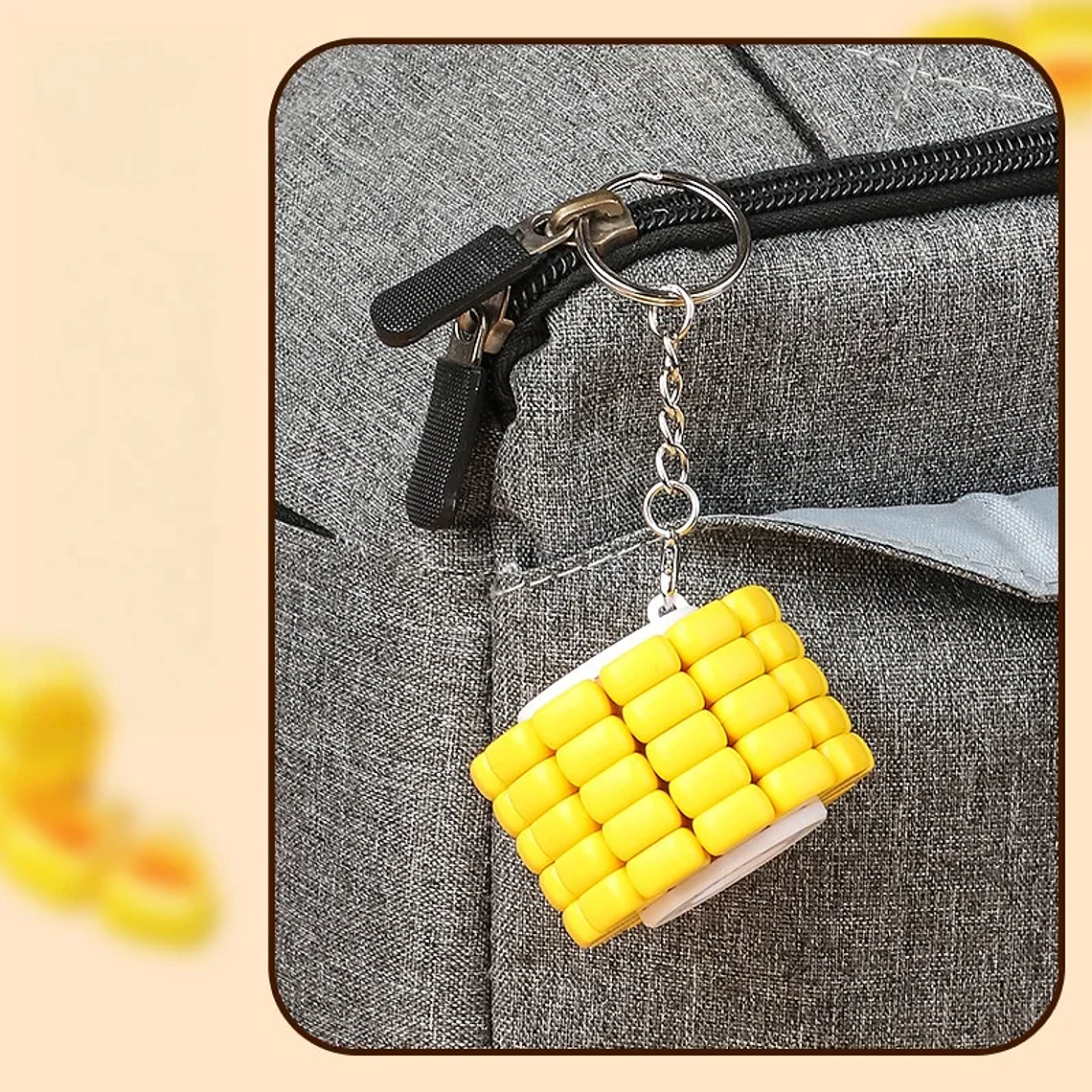 Juguete Sensorial Mini LLavero Maiz, con luz y granos desmotables. 5