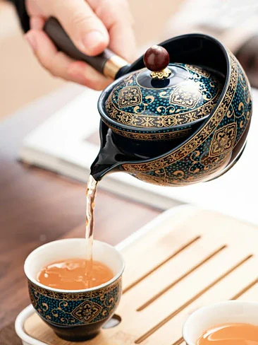 🍵 ¡SET DE TÉ CERÁMICO GONGFU CON ROTACIÓN DE 360° Y ESTUCHE DE VIAJE PREMIUM! 🏔️✨ 2