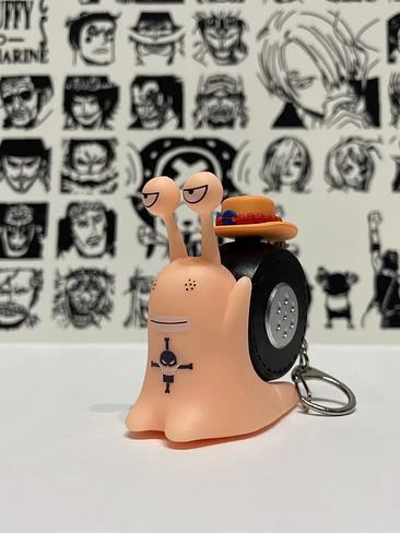 🐌 ¡El Coleccionable Definitivo de One Piece! Llaveros Grabadores de Den Den Mushi 🏴‍☠️✨ 8