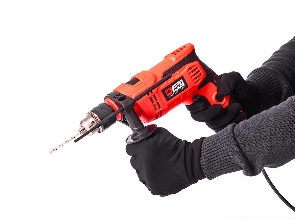 TALADRO DE IMPACTO CON PERCUTOR 710 W 2