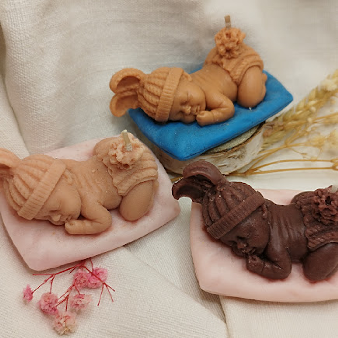 vela bebé em almofada  2