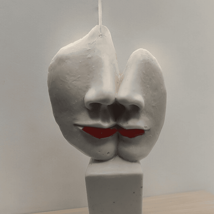 Vela estátua caras metades 2