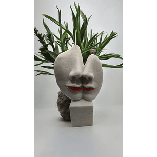 Vela estátua caras metades