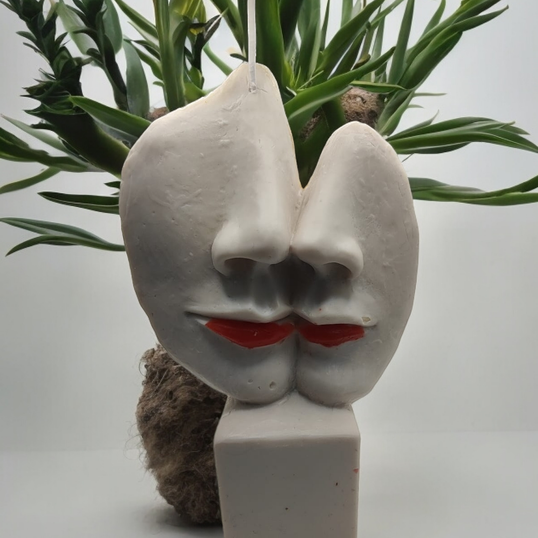 Vela estátua caras metades 1