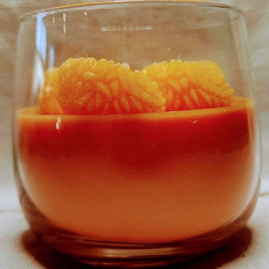 Vela em copo laranja com gomos  2