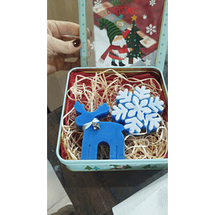 Lata com duas velas de Natal 