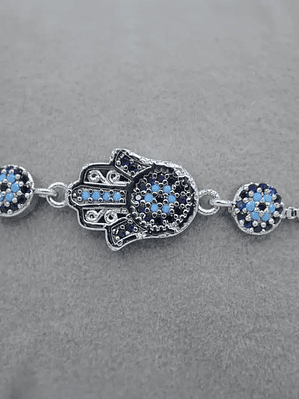 Pulsera Con Mano Y Ojos Turcos De Acero Bañado En Rodio