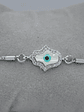 Pulsera En Acero Bañado En Rodio Con Mano Y Ojo Turco - Miniatura 3