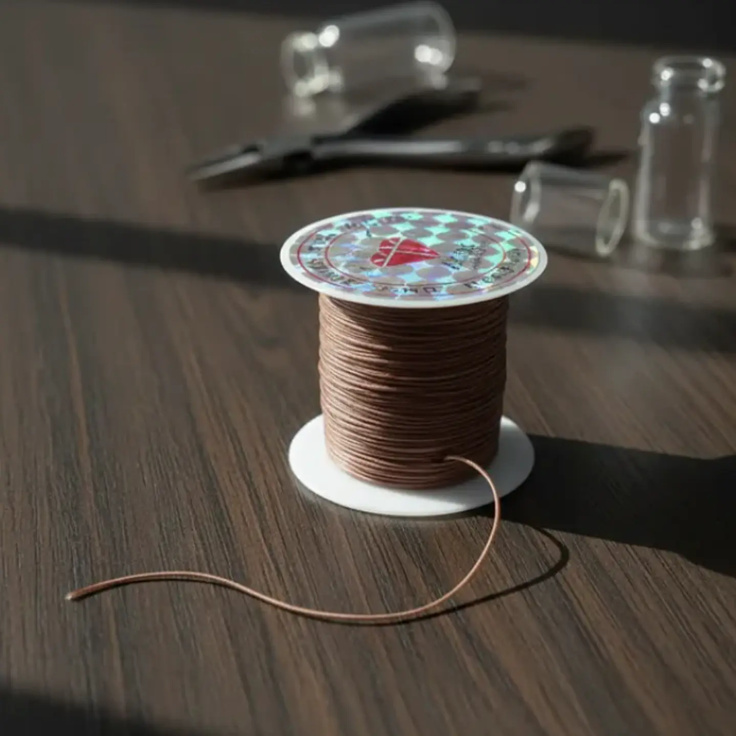 Hilo Elastico Para Pulsera 0.6 Mm Color Café Claro 20 Mtrs 7