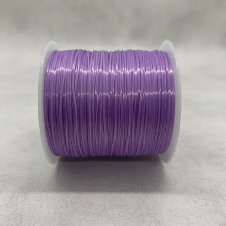 Hilo Elastico Para Pulsera 0.6 Mm Color Lila 20 Mtrs 9