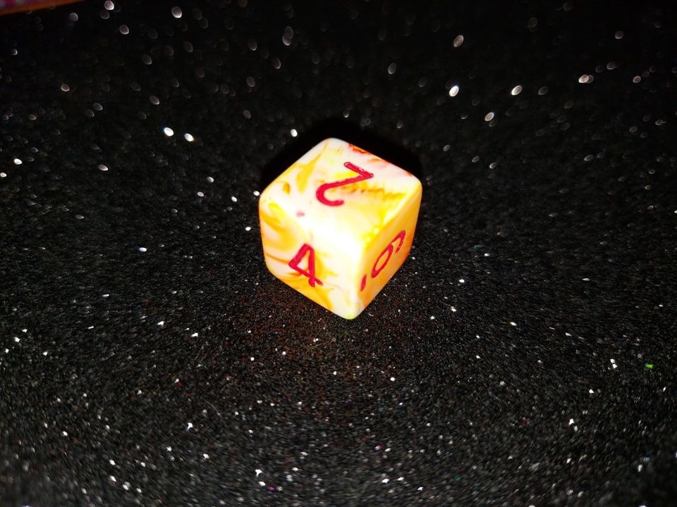 Dado 6 caras - Chessex - Naranja Blanco 1