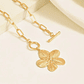 Collar dorado con dije de flor - Miniatura 2