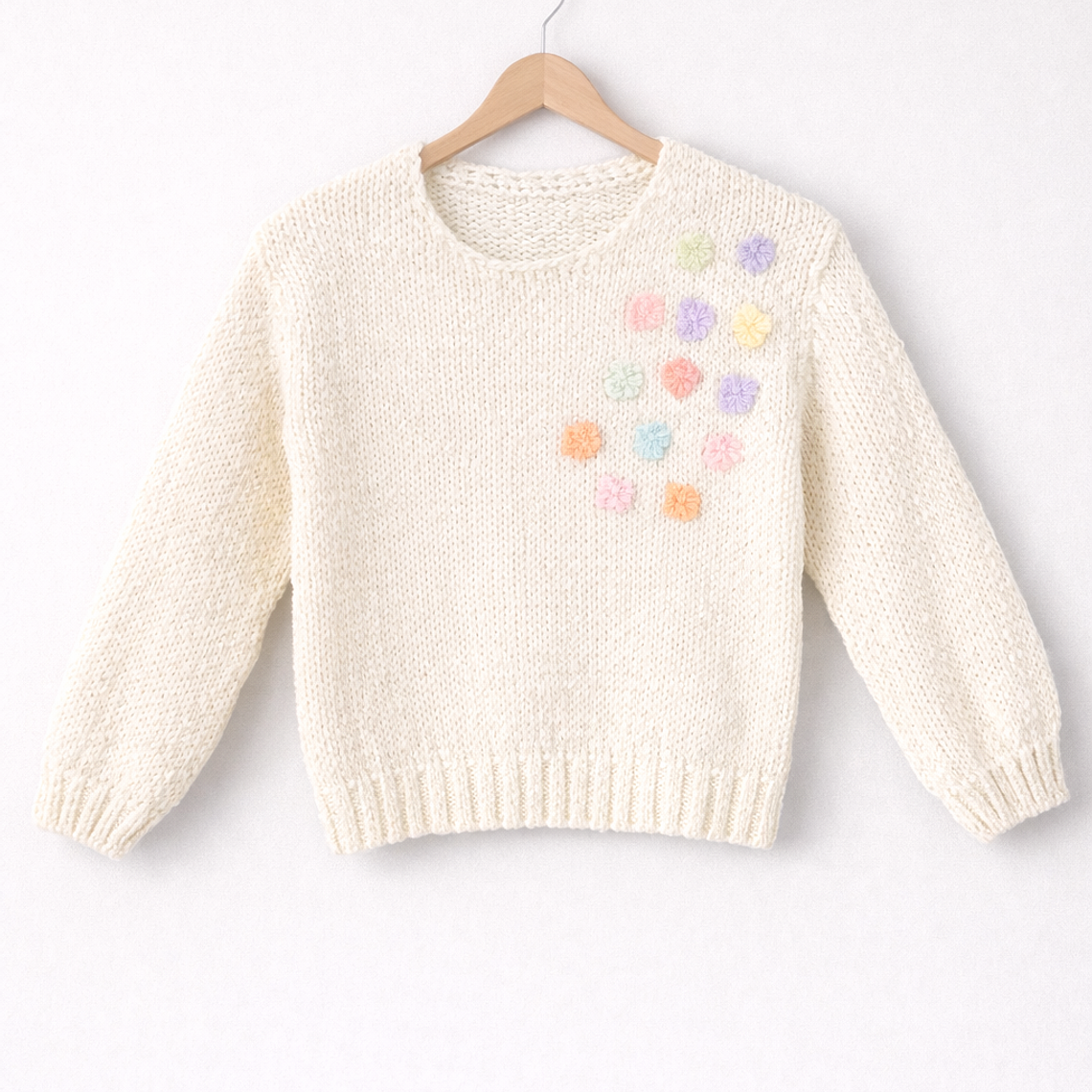 Suéter con flores en relieve pastel 6