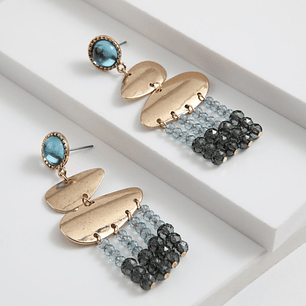 Aros dorados con cristales en tonos azules