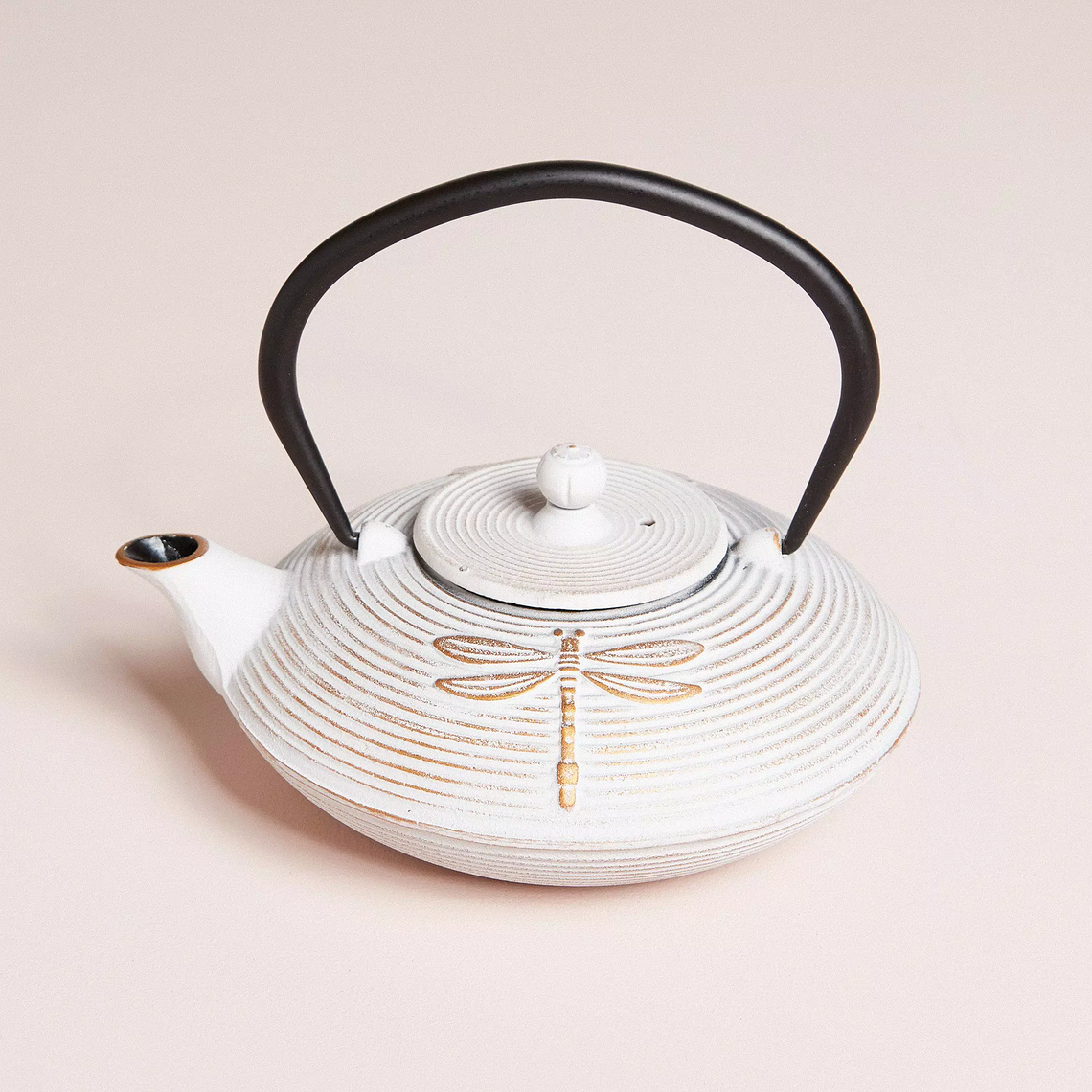 Tetera de hierro fundido blanca con diseño libélula 1