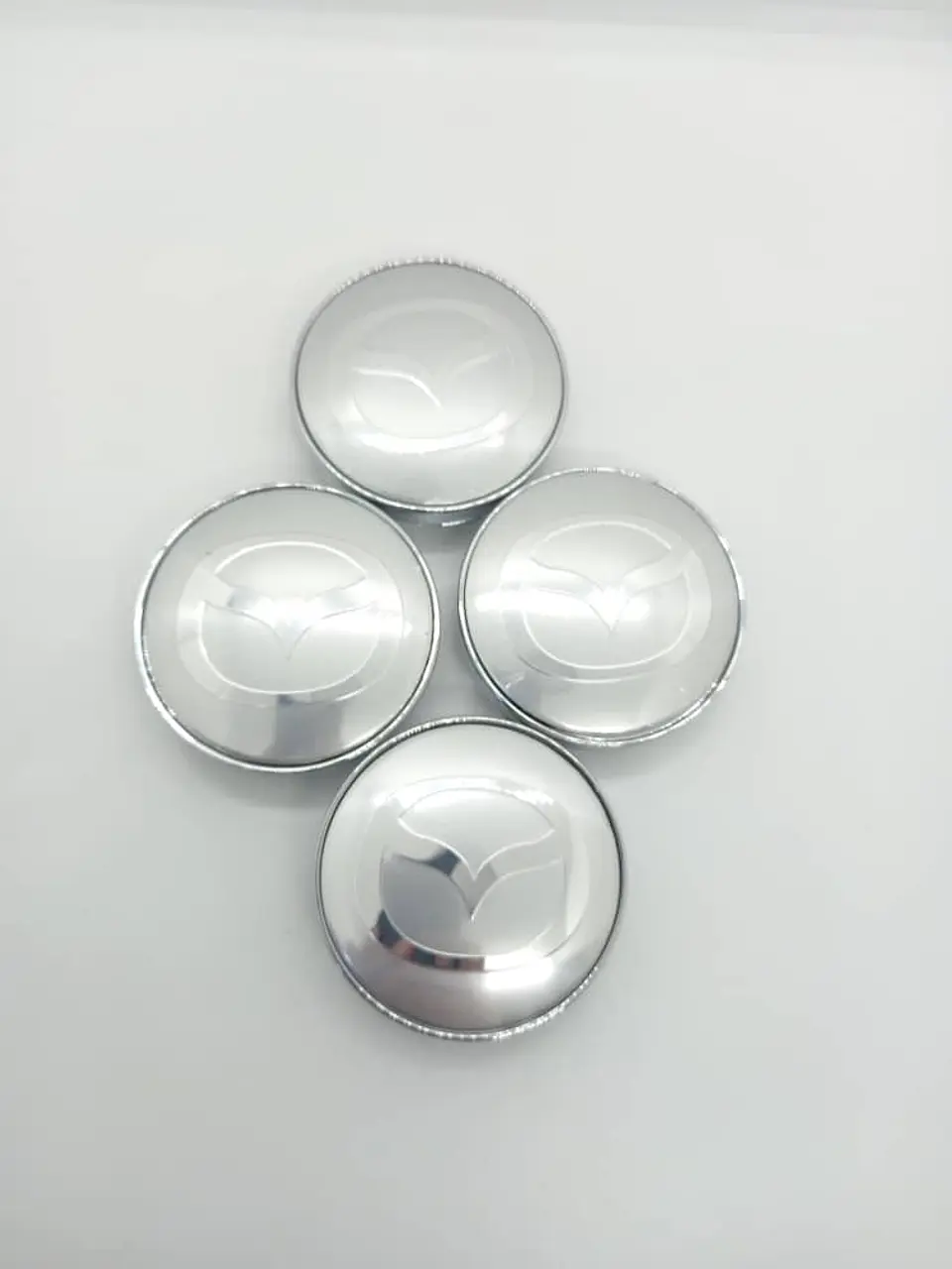 Set X4 Tapa centro de Llantas de autos universal marca Mazda plateada 4