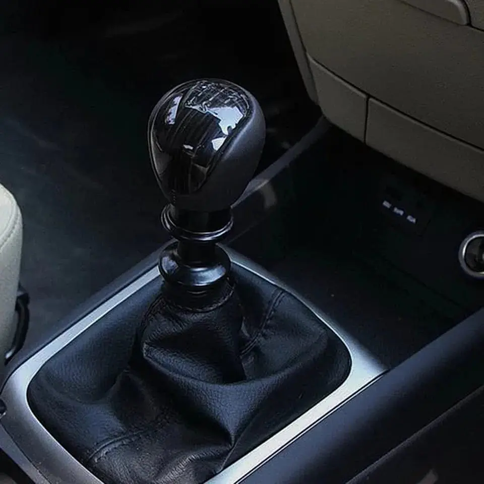 Pomo palanca cambios cuero 5 vel. con seguro - Cerato/Zotye 6