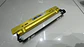 Porta placa patente fibra de carbono - amarillo dorado marca nismo - thumbnail 3