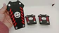 Set cubre pedales carita feliz, 3pzs - Negro/Rojo - Miniatura 3