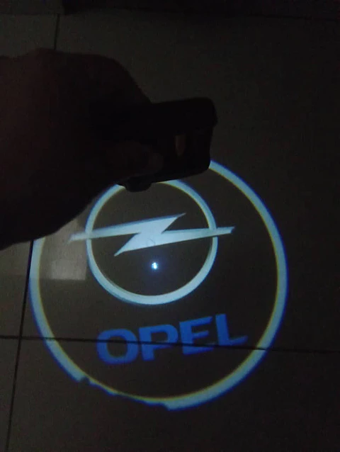X2 luces LED cortesía puertas (a batería triple A) - Opel