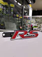 Emblema de parrilla apernado metalico modelo RS cromado con rojo - Miniatura 2