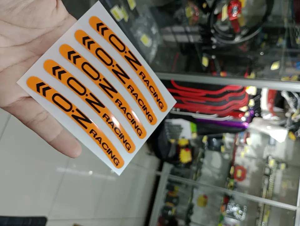 Set X5 pegatinas reflectantes Oz Racing para llantas - Naranja/Negro 6