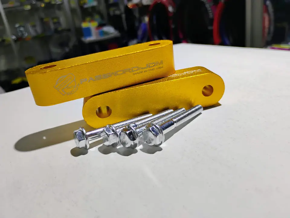 X2 elevadores espaciadores capó aluminio - Dorado 1
