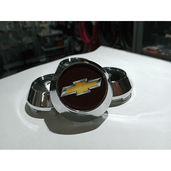 Oferta Remate X4 Tapas centro de llantas de auto tunning conica Medidas disponibles 58mm interior X 60mm exterior chevrolet negra con logo  precio 16990 pesos 4