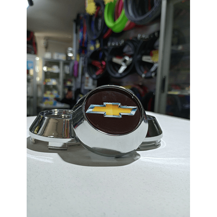 Oferta Remate X4 Tapas centro de llantas de auto tunning conica Medidas disponibles 58mm interior X 60mm exterior chevrolet negra con logo  precio 16990 pesos 9