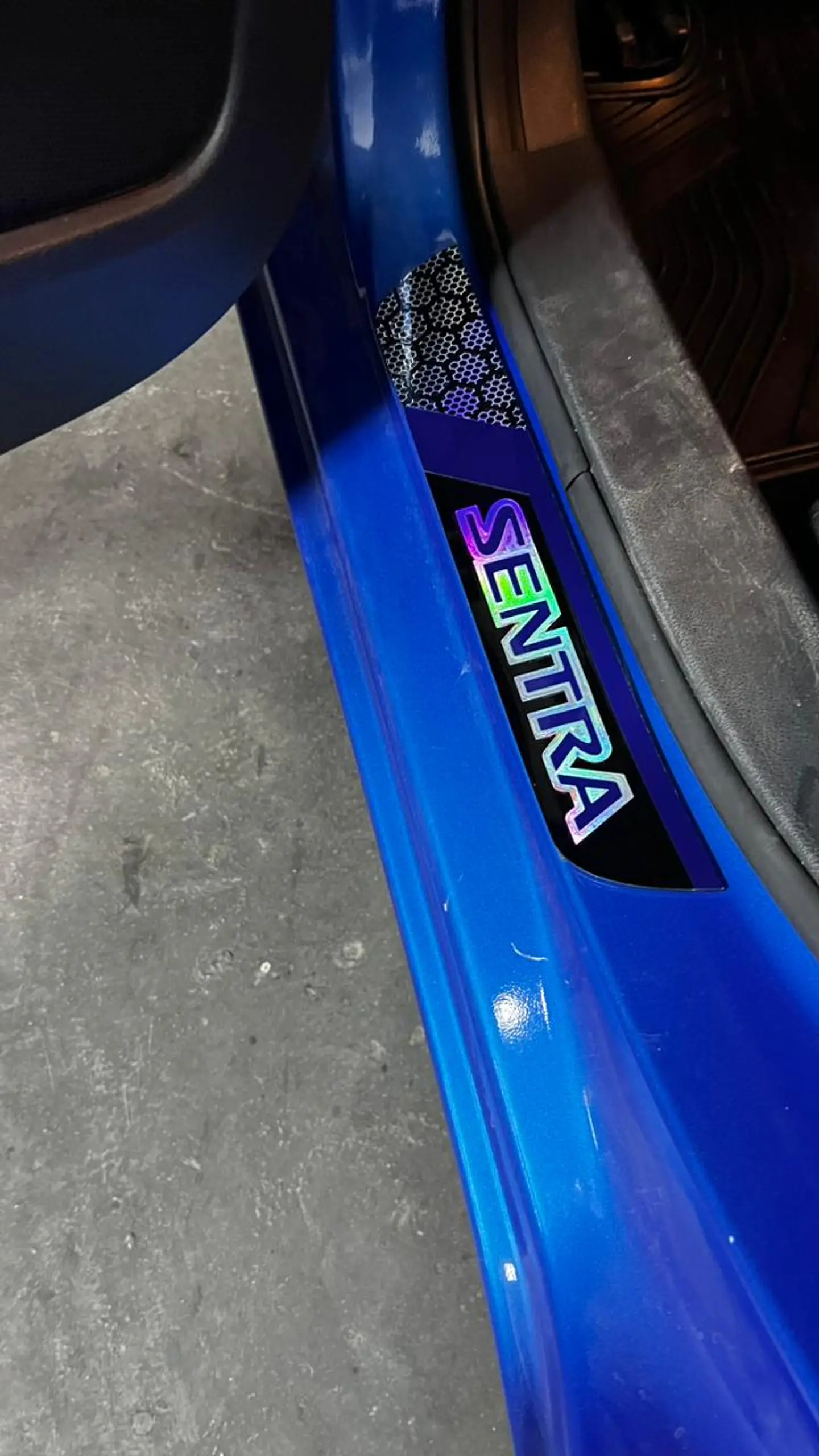 Cubre zócalos/pisadera multifunción acrílico - Nissan Sentra 8