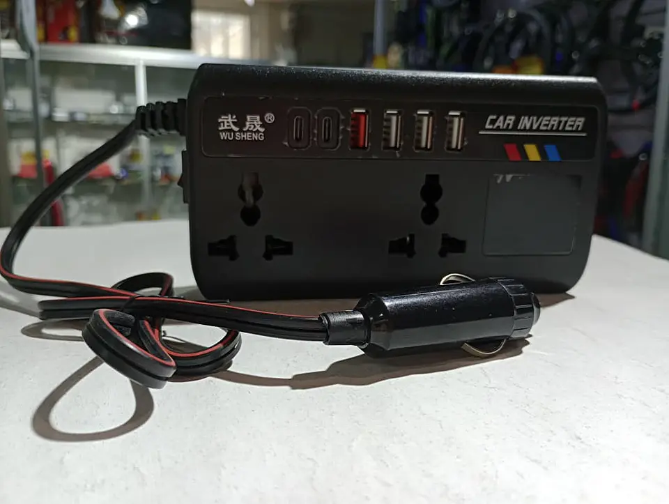 Inversor de Corriente para autos 12V/24V a 220V AC 200W 1