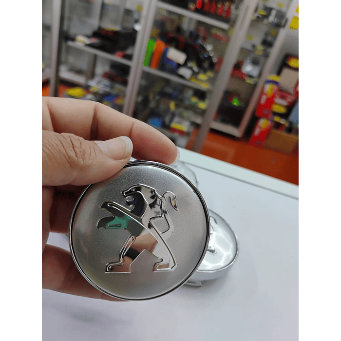 ¡Gran oferta! 🚗💥 *Set x4 Tapas para Centro de Llantas PEUGEOT plata*.  1