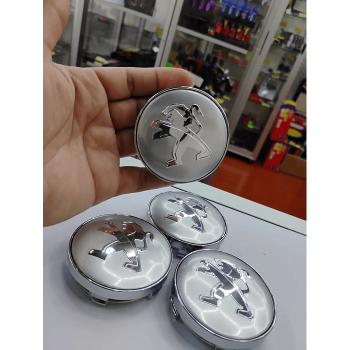 ¡Gran oferta! 🚗💥 *Set x4 Tapas para Centro de Llantas PEUGEOT plata*.  5