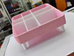 Organizador de plástico con compartimentos, diseñado típicamente - Miniatura 1