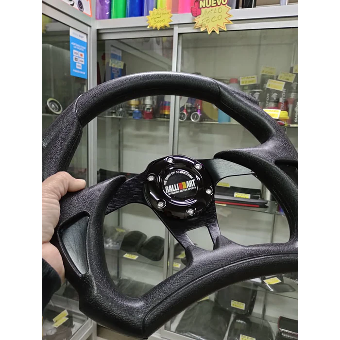 Volante de auto tipo D universal Tunning deportivo marca Rally art con botón de bocina medida 31cm diámetro externo centro negro 3