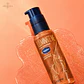 Vaseline Illuminate Me Shimmering Body Oil - Miniatura 3