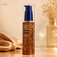 Vaseline Illuminate Me Shimmering Body Oil - Miniatura 1