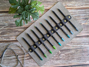 Estuche de cuero roll-on con 9 compartimientos color Gris