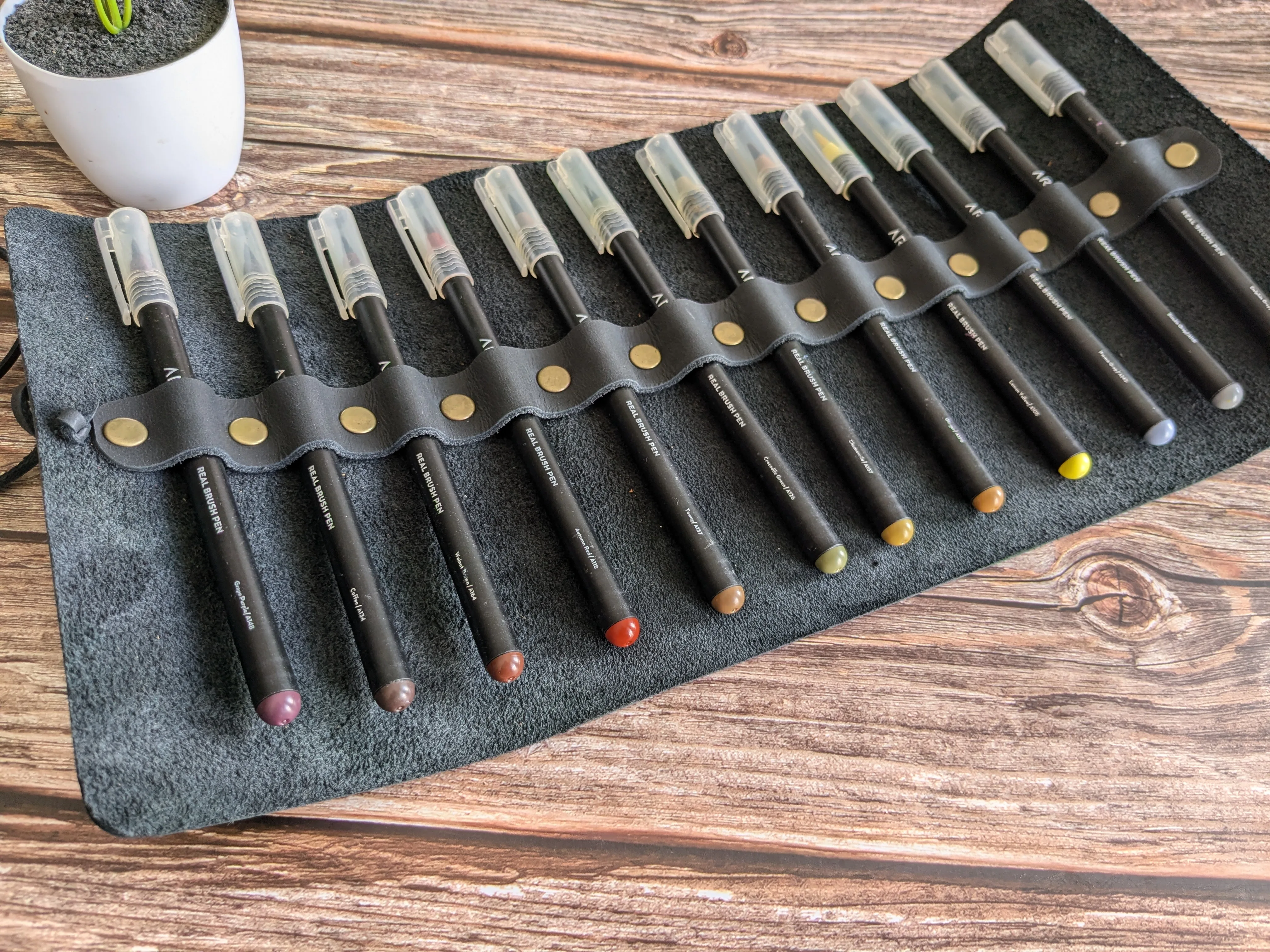 Estuche de cuero roll-on 12 compartimientos Negro 9