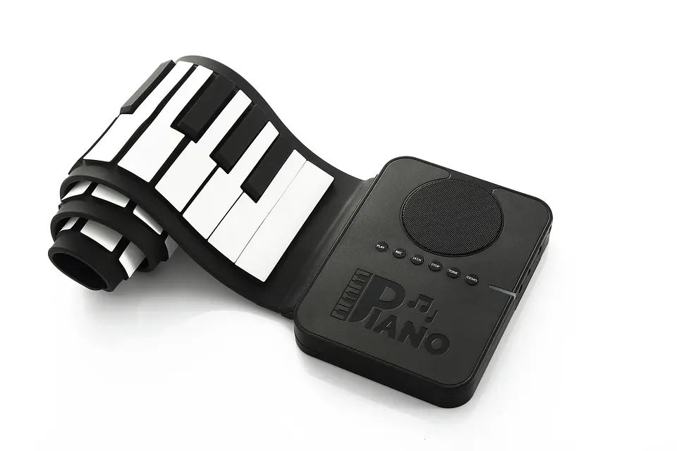 Piano de silicona, con parlante incorporado y funcionamiento a pilas 6
