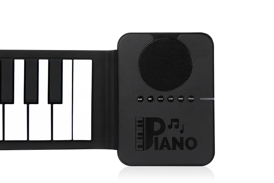 Piano de silicona, con parlante incorporado y funcionamiento a pilas 7
