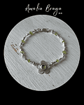 Pulsera peridotos y flor