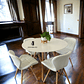 Comedor Mesa Redonda Melamina Eames Blanca  + Sillas Radar - Miniatura 1