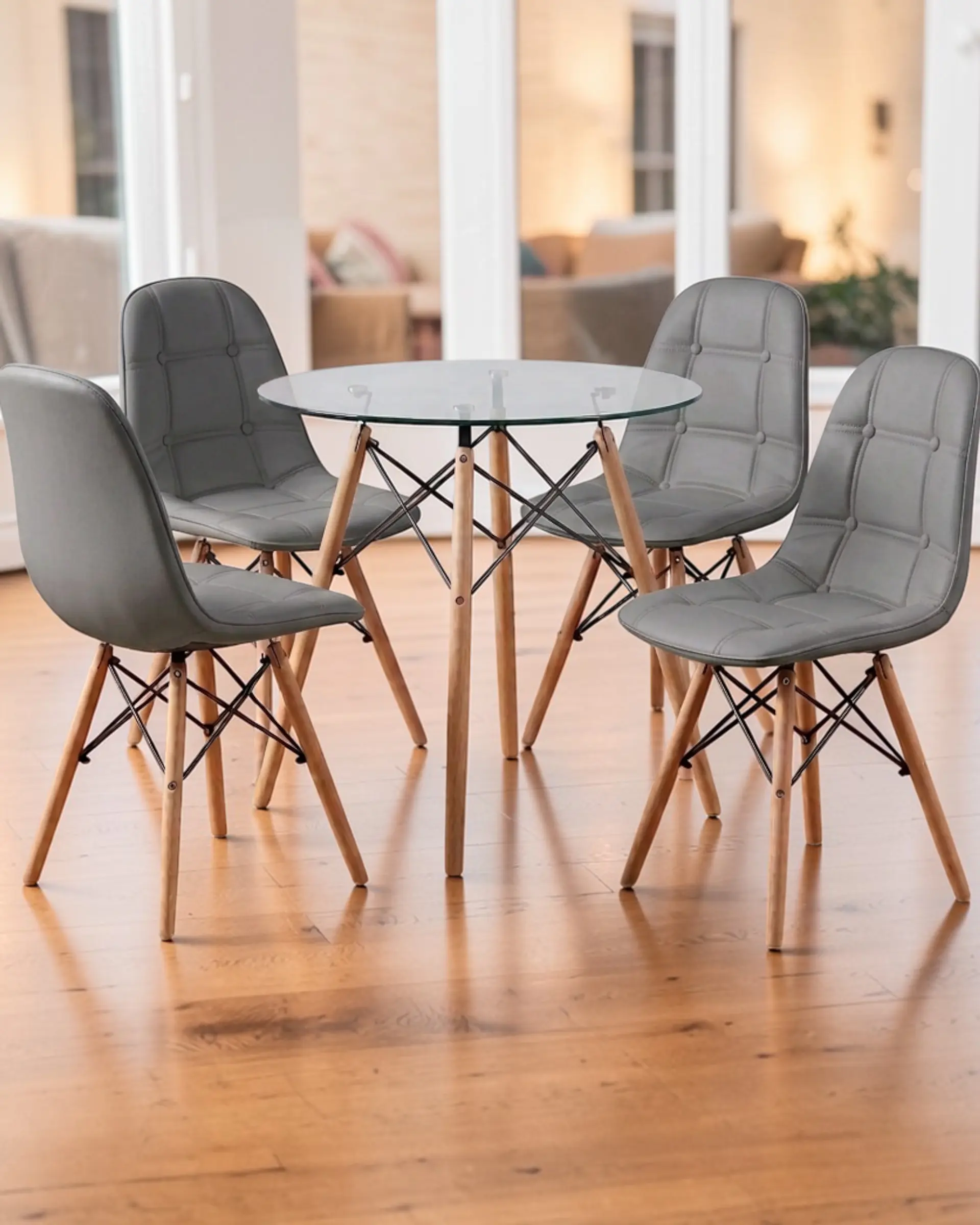Comedor Redondo Vidrio Eames con Sillas Buckle 3
