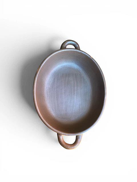 Budinera mediana ovalada con oreja 