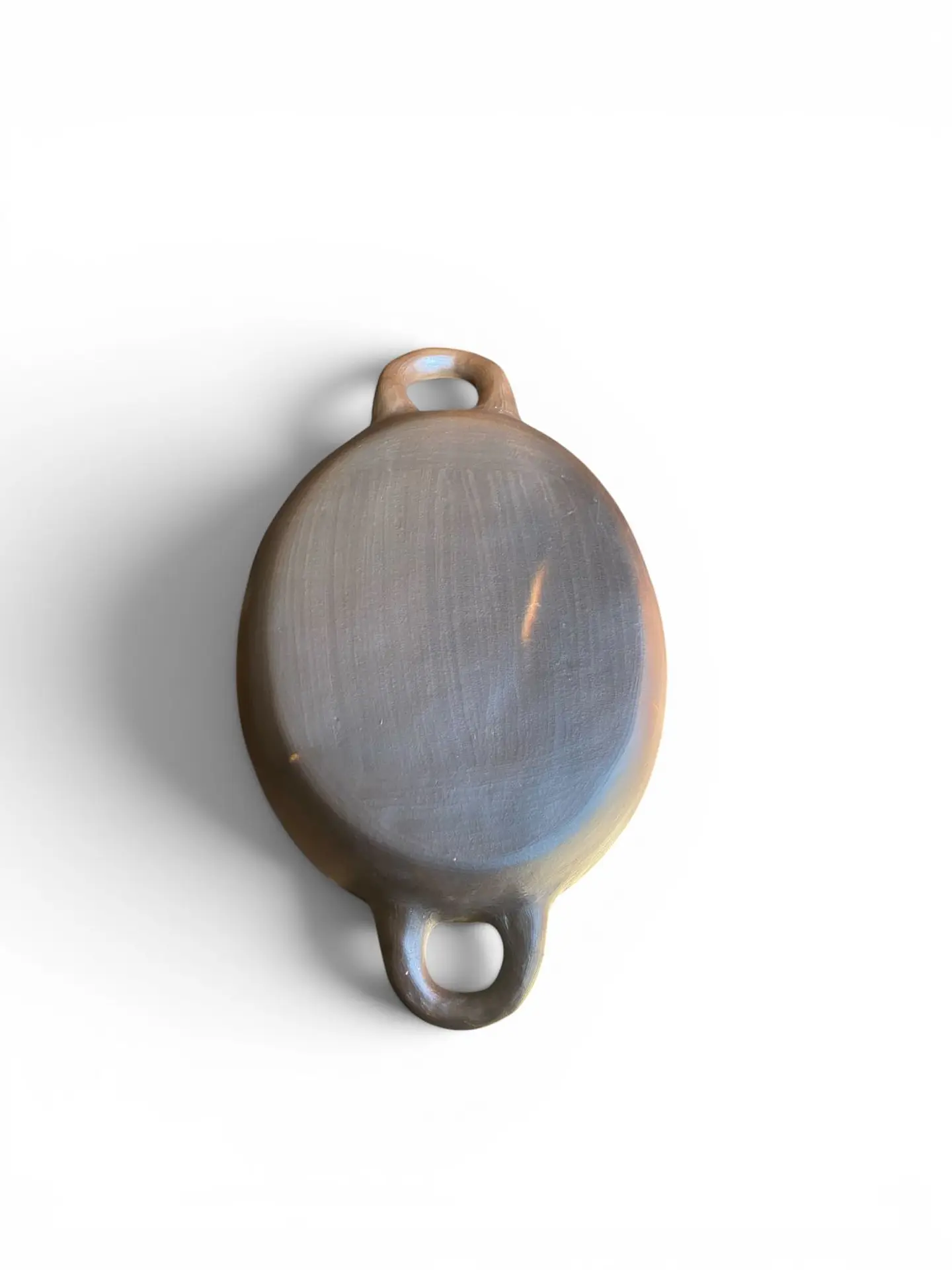 Budinera mediana ovalada con oreja  3