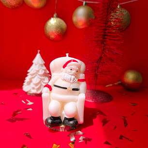 Vela decorativa “Viejito Pascuero sentado”